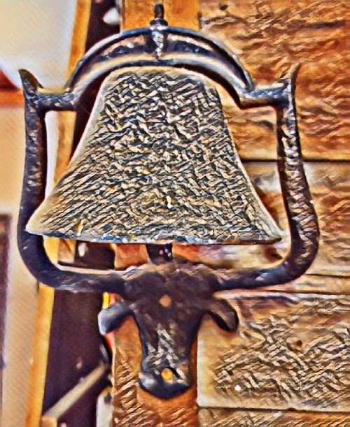 A close up of the bell on a lamp